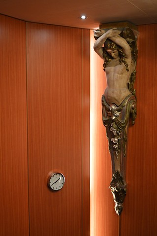 photograph of clock mermaid statue pillar cruise ship by Robyn LeRoy-Evans