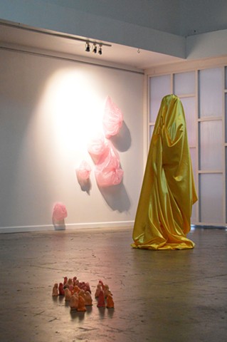 live performance yellow satin figure by Robyn LeRoy-Evans