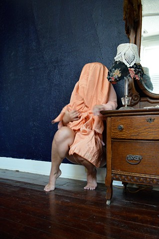 photograph of woman veiled shroud trembling afraid interior by Robyn LeRoy-Evans