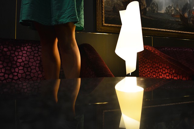 photograph of woman legs table lamp lounge cruise ship by Robyn LeRoy-Evans