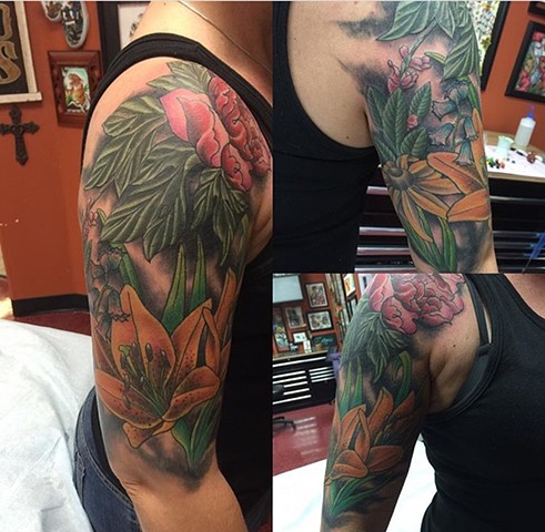 botanical half sleeve tattoo in colour Strange World Tattoo Calgary,Alberta Canada