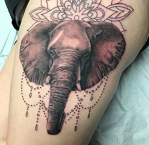 mandala and elephant tattoo in black and grey Strange World Tattoo Calgary Alberta Canada 