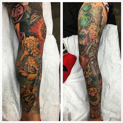 Full leg sleeve tattoo of The Muppet's as iconic Horror Movie characters by Brett Schwindt at Strange World Tattoo 