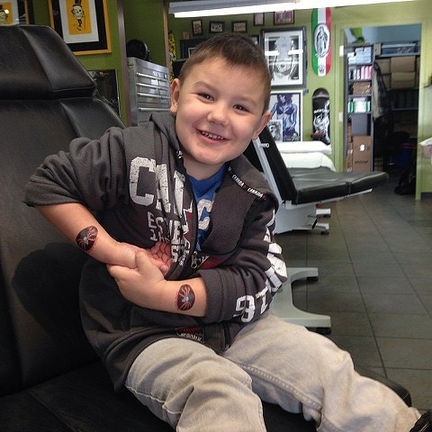 kids of our tattoo and piercing clients at Strange World Tattoo in Calgary