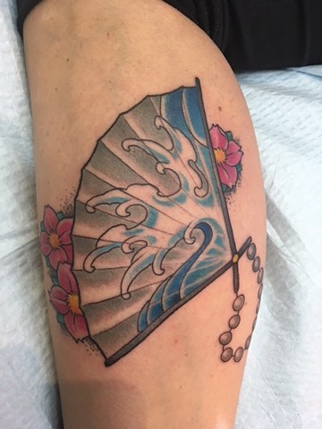 Japanese fan tattoo and cherry blossoms by Brett Schwindt at Strange World Tattoo in Calgary, Alberta