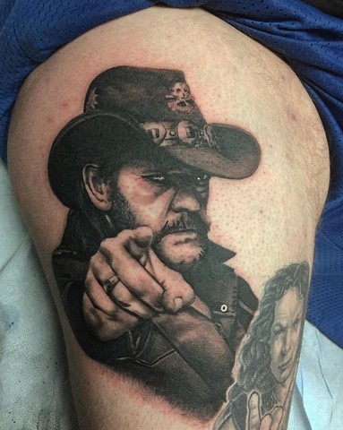 Lemmy tattoo in black and grey on upper thigh Strange World Tattoo Calgary, Alberta