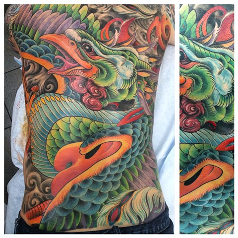 full back piece tattoo of a phoenix design by the talented Brett Schwindt of Strange World Tattoo in Calgary 