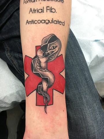 medical alert tattoo calgary, canada strange world tattoo