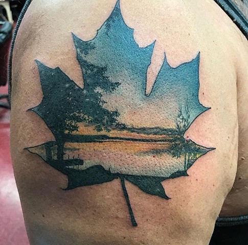 Maple leaf colour tattoo Strange World Tattoo Calgary, Canada