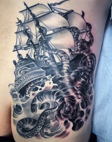 black and grey pirate ship tattoo by artist Brett Schwindt of Strange World Tattoo in Calgary