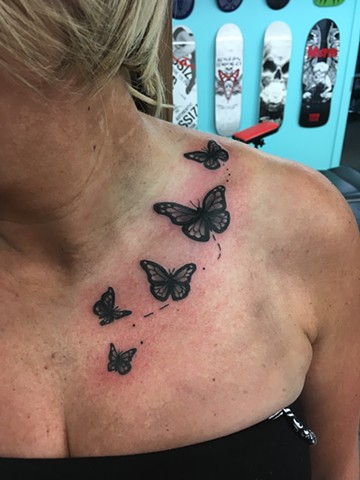 butterfly tattoos at strange world tattoo in calgary, alberta