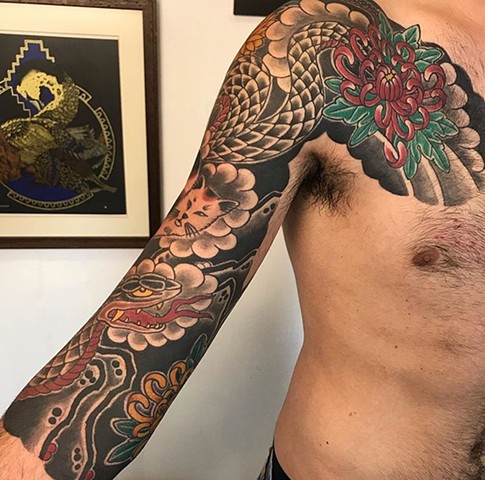 Japanese snake sleeve tattoo with chest panel strange world tattoo calgary alberta canada tattoo artist's japanese tattoos  
