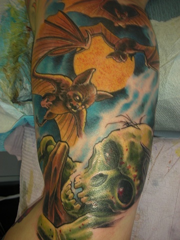 Tattoo of zombie and bats 