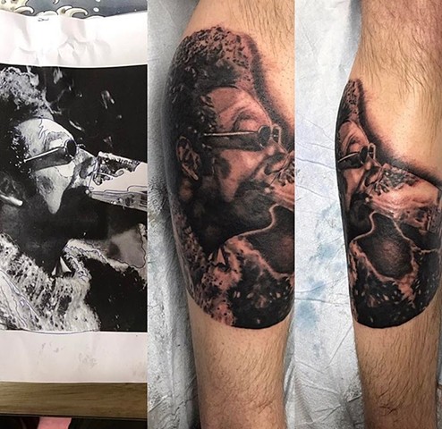 Kramer portrait tattoo in Black and grey Strange World Tattoo Calgary 