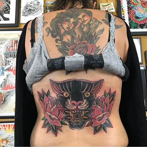 Panther Head tattoo with roses traditional tattoos Strange World Tattoo Calgary Alberta Canada 