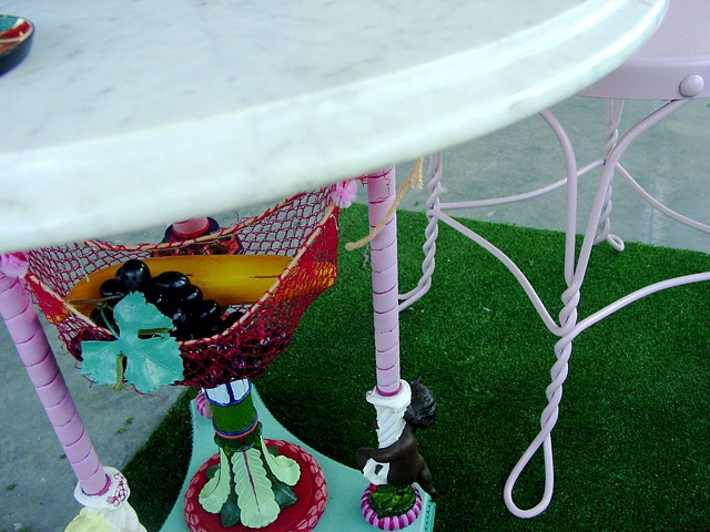 cherub table and fruit hammock detail