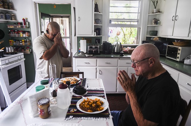 Mulligan and Correa spend a moment before sitting down to a meal July 22, 2014. (click to read caption)