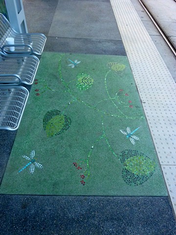 Moody Park Light rail Station in Houston, Texas. 
Lithocrete and lithomosaic  rug on the platform.
