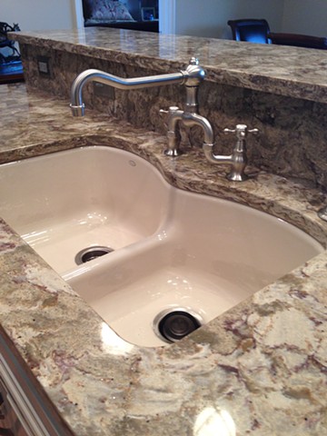 New sink and counter in the island.