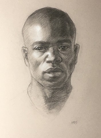 Charcoal portrait drawing on paper