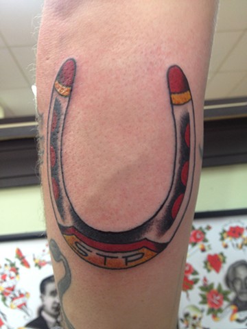 traditional horseshoe tattoo