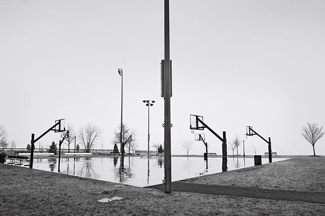 Photograph of a basketball court in the rain, Scenic Hudson Park, Irvington, NY, by Judith Ebenstein
