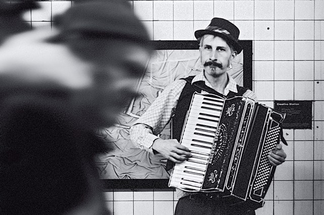 Photograph of an Old World Accordionist, 14th Street Subway Station, Manhattan, New York, by Judith Ebenstein