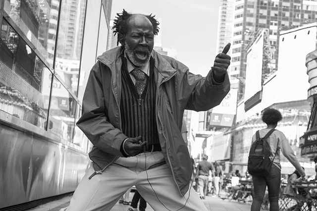 Photograph of a dancer, Times Square, Manhattan, NY, by Judith Ebenstein