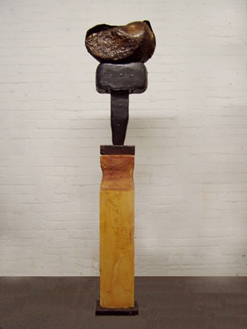a mixed media Sculpture in bronze iron and Limestone based on a composition by Isumu Noguchi