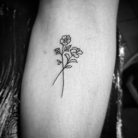 Minimal flower tattoo