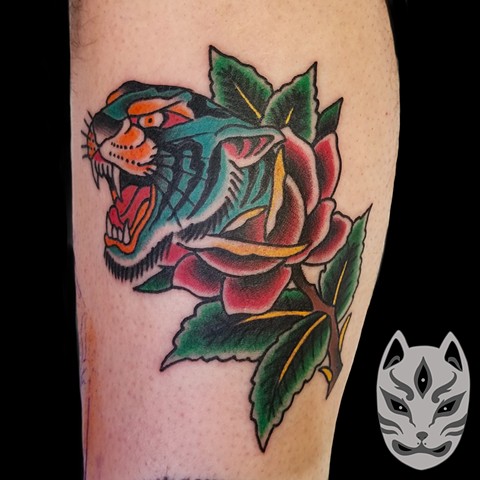 Traditional style tiger in rose tattoo on lower leg by Gina Marie of Copper Fox Tattoo in Kissimmee Florida 