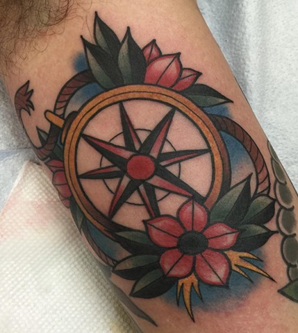 American Traditional style compass in color by Klint Who of Copper Fox Tattoo in Kissimmee Florida Best tattoo shop