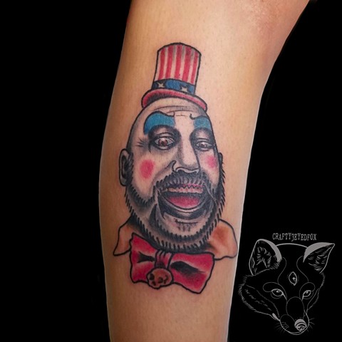 Captain Spaulding tattoo in traditional style on lower leg