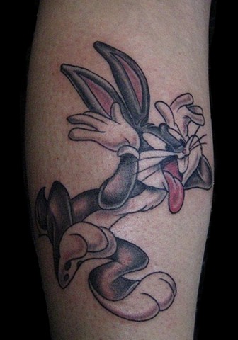 Bugs Bunny design on lower leg full color by Gina Marie of Copper Fox Tattoo Company