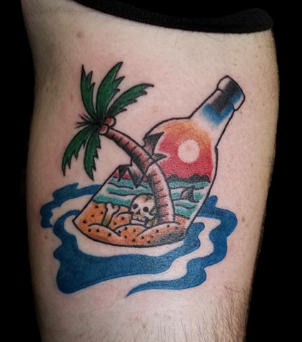 Traditional tattoo or beach scene in a bottle by Gina Marie of Copper Fox Tattoo