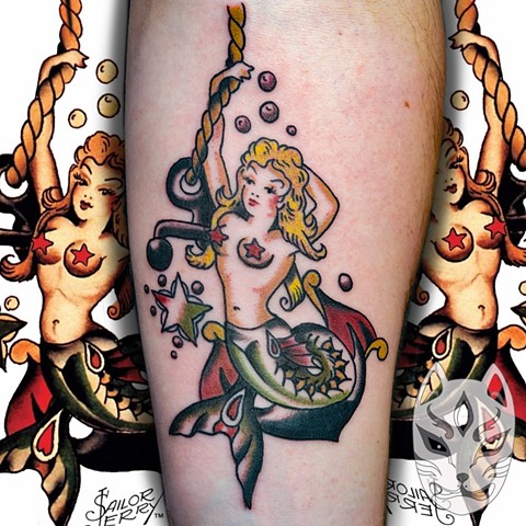 Traditional tattoo of sailor Jerry design Mermaid by Gina Matuo of Copper Fox Tattoo in Kissimmee Florida
