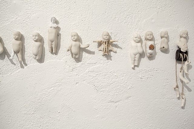 voodoo dolls, porcelain slip cast, mixed media installation, lauren carter
