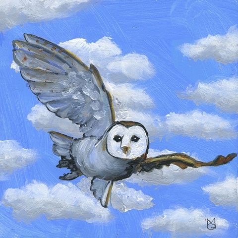 Owl wheeling in air