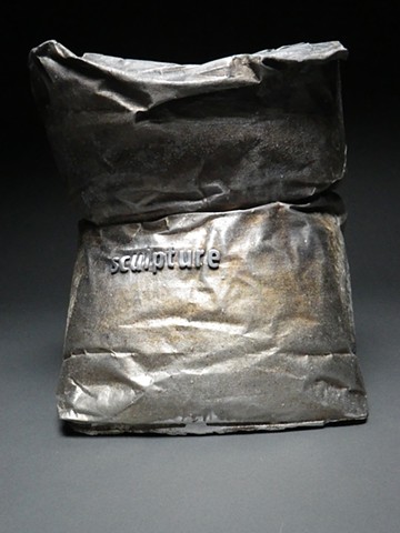 Cast aluminum sculpture sand bag 