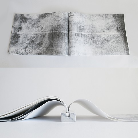 Undare
Book in marble holder and collophon spread