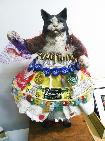 Cat in a new dress- raku ceramics and recycled stuff -lisa schumaier