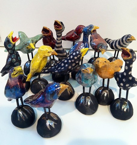 small raku glazed birds