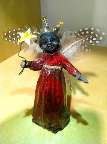 Little raku ceramic African-American angel by lisa schumaier