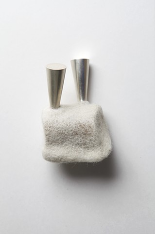 Adaptation 2 (brooch): wool, sterling silver; needle felted, formed, fabricated by Sara Owens