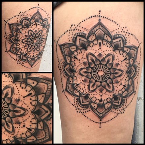 this is a black and grey mandala done by amanda marie lady tattooer in los angeles california at evermore tattoo 