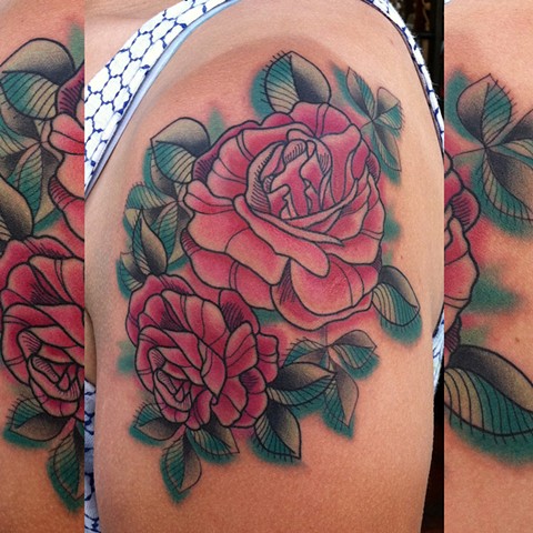 this is a tattoo of roses done in a watercolor style by amanda marie at evermore tattoo in culver city los angeles california 