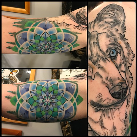 this is a spirit animal tattoo of a wolf including a mandala and sacred geometry done by amanda marie tattooer at ace of wands private tattoo studio in san pedro california los angeles 