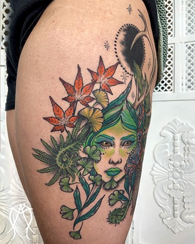This is a color tattoo done of Mother Earth it is ornate detailed and nature based done by tattoo artist and tarot reader Amanda Marie at her private tattoo and tarot studio in Scipio center New York near Ithaca New York east coast tattoo ace of wands tat