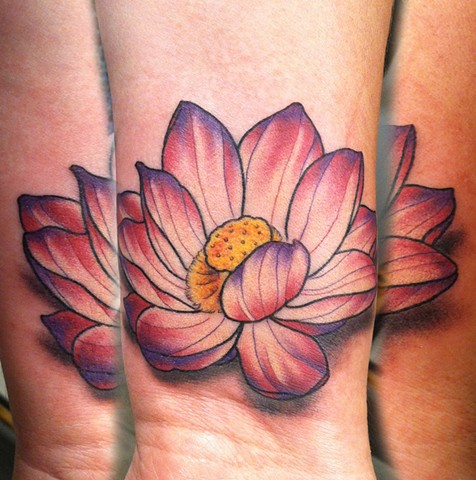 This is a tattoo of a pink lotus flower done by amanda marie at evermore tattoo in los angeles california 