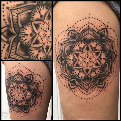 this is a black and grey mandala tattoo done by amanda marie tattooer in los angeles california at evermore tattoo 